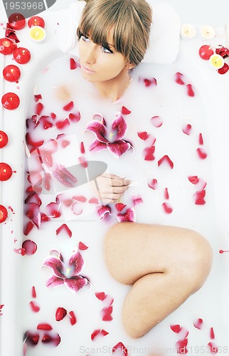 Image of woman bath flower