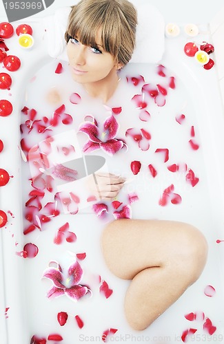 Image of woman bath flower