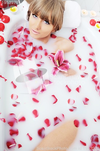 Image of woman bath flower