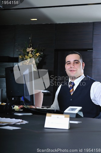 Image of recetion man in hotel