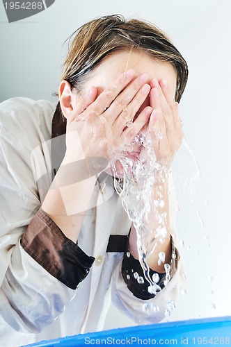 Image of woman face wash