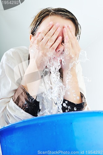 Image of woman face wash