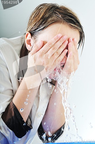 Image of woman face wash