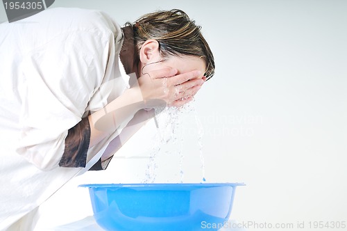 Image of woman face wash