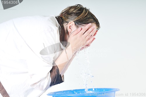 Image of woman face wash