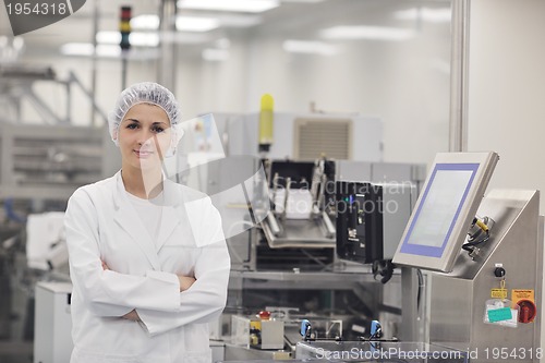 Image of woman worker in pharmacy company