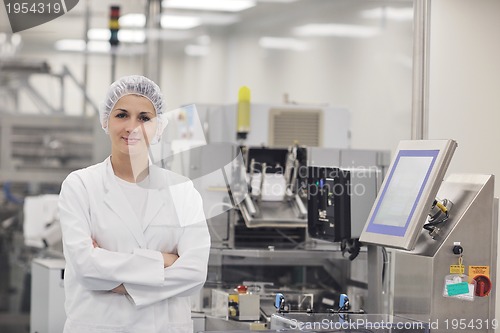 Image of woman worker in pharmacy company