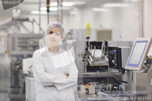 Image of woman worker in pharmacy company