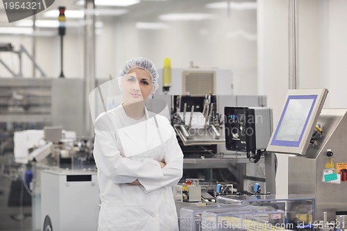 Image of woman worker in pharmacy company