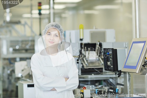 Image of woman worker in pharmacy company