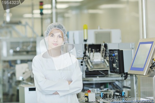 Image of woman worker in pharmacy company