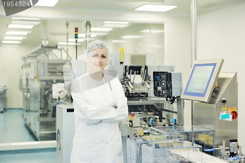 Image of woman worker in pharmacy company