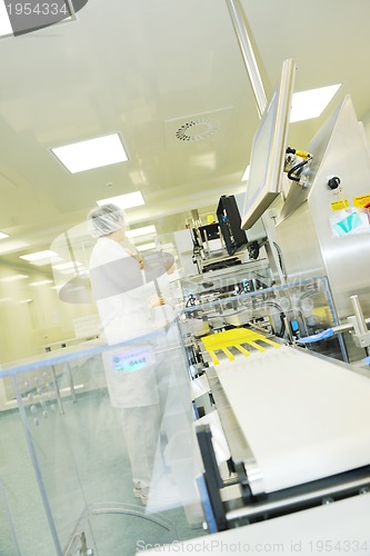 Image of woman worker in pharmacy company