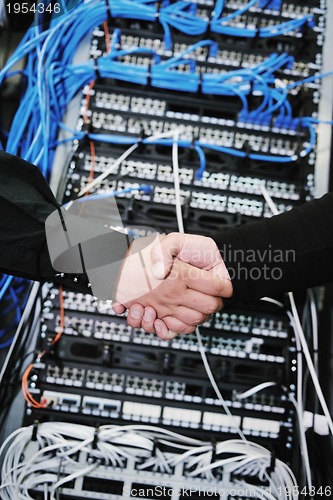 Image of it engineer in network server room