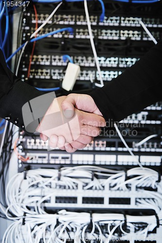 Image of it engineer in network server room