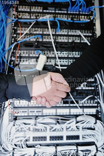 Image of it engineer in network server room