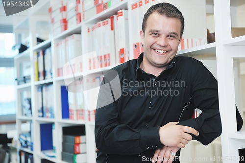 Image of male adult in archive library