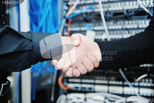 Image of it engineer in network server room