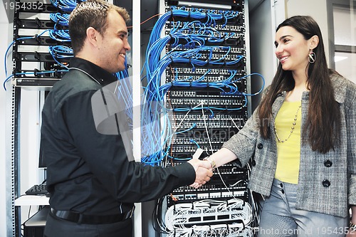 Image of it engineer in network server room