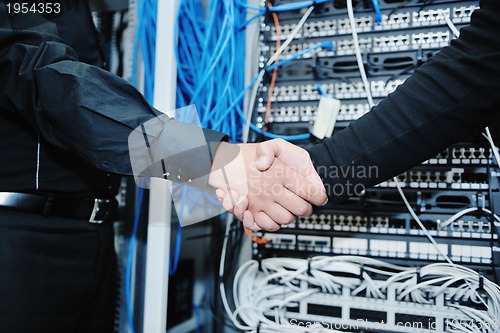 Image of it engineer in network server room