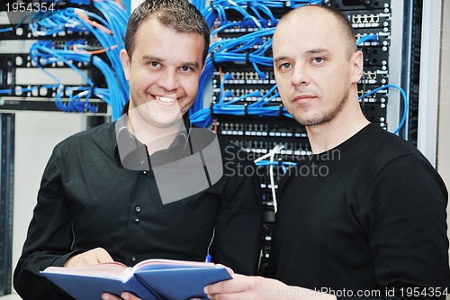 Image of it engineer in network server room