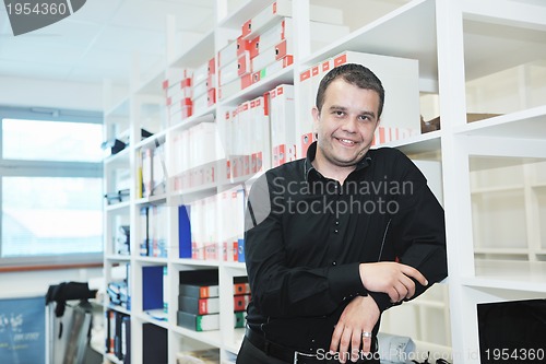 Image of male adult in archive library
