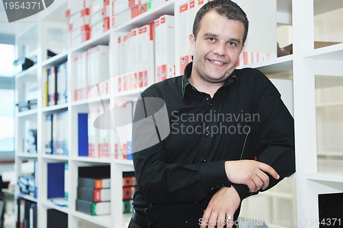 Image of male adult in archive library