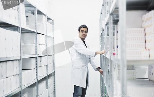 Image of medical factory  supplies storage indoor