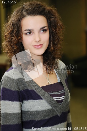 Image of young woman indoor