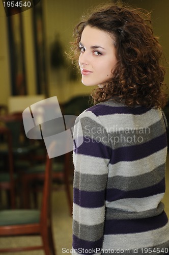 Image of young woman indoor