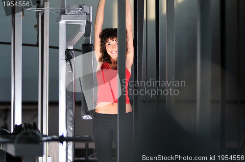 Image of young woman practicing fitness and working out