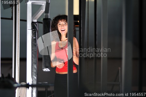 Image of young woman practicing fitness and working out