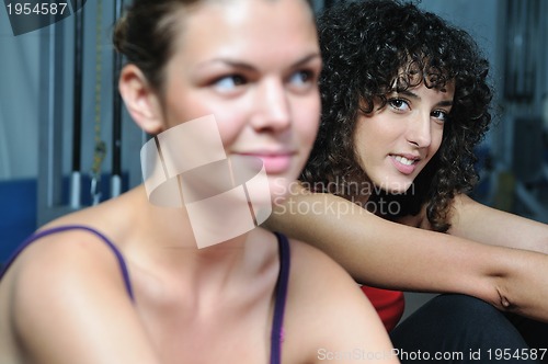 Image of young woman practicing fitness and working out