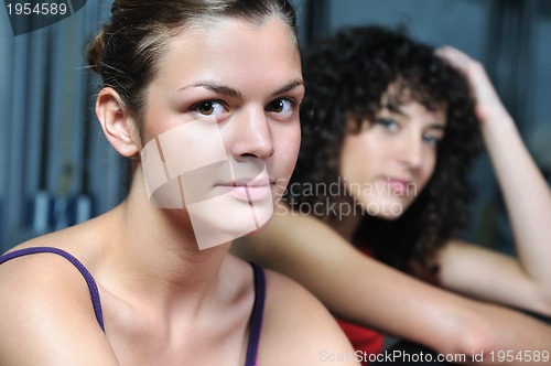 Image of young woman practicing fitness and working out