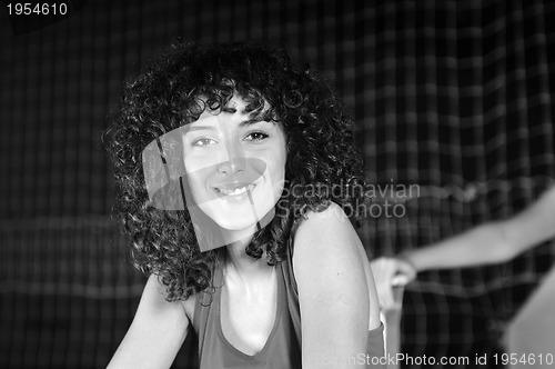 Image of young woman rerlaxing fitness and working out