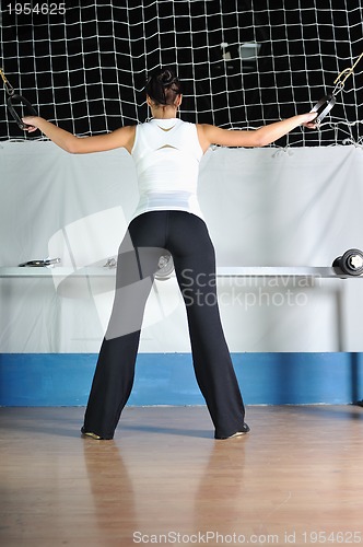 Image of young woman practicing fitness and working out