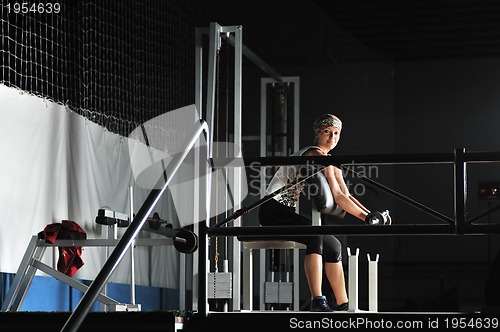 Image of young woman practicing fitness and working out