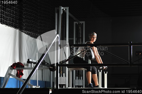 Image of young woman practicing fitness and working out