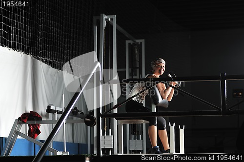 Image of young woman practicing fitness and working out