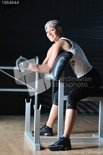 Image of young woman practicing fitness and working out
