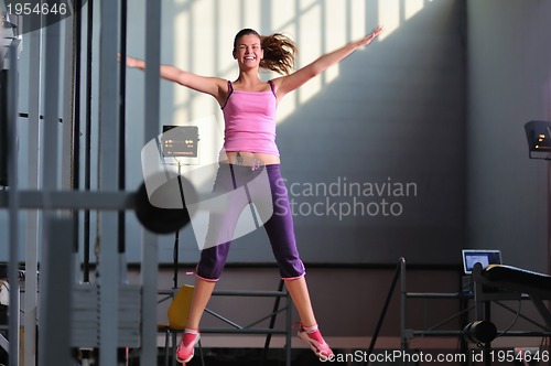 Image of one young happy  woman jump