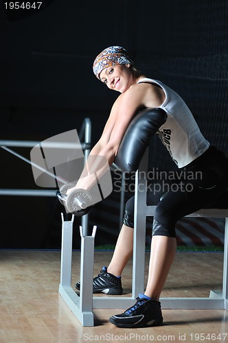 Image of young woman practicing fitness and working out