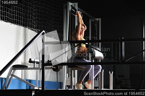 Image of young woman practicing fitness and working out