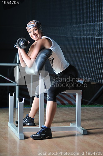 Image of young woman practicing fitness and working out