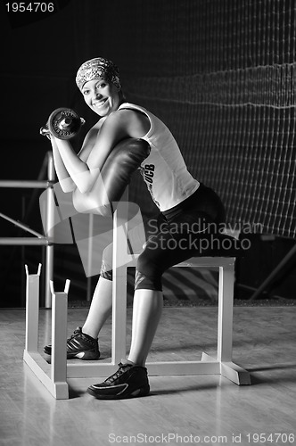 Image of young woman practicing fitness and working out