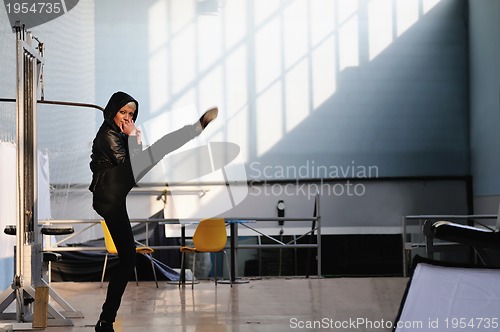 Image of young woman practicing fitness 