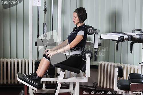 Image of young  woman work out in fitness