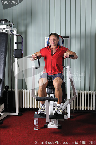 Image of Strong  man work out in gym