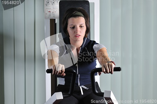 Image of young  woman work out in fitness