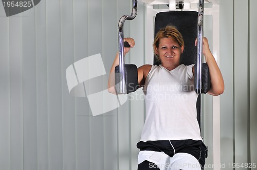 Image of Mature  woman work out in fitness